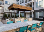 Thumbnail 25 of 46 - Element 25 outdoor BBQ grill seating area