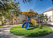 Thumbnail 27 of 44 - Almeria at Ocotillo apartments exterior playground