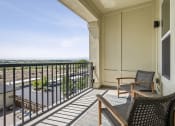 Thumbnail 29 of 30 - Private patio and balconies available a balcony with two chairs and a table and a view of the ocean