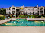 Thumbnail 30 of 30 - Resort-style swimming pool at dusk - Emmersyn at Lone Tree