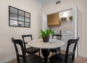 Thumbnail 33 of 37 - Antelope Ridge Apartments dining nook and washing machines