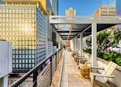 Thumbnail 41 of 42 - Rooftop terrace with ample seating - Main 3 Downtown