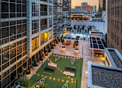 Thumbnail 42 of 42 - Rooftop terrace with games and ample seating - Main 3 Downtown