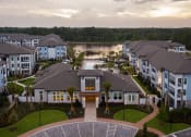 Thumbnail 10 of 21 - Drift Town Center East aerial view of buildings and lake