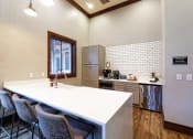 Thumbnail 4 of 28 - The Estates at River Pointe clubhouse kitchen and coffee bar