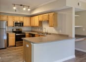 Thumbnail 17 of 28 - The Estates at River Pointe stainless steel appliances