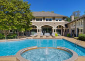 Thumbnail 19 of 28 - The Estates at River Pointe resort-style pool area with heated spa