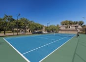 Thumbnail 23 of 28 - The Estates at River Pointe outdoor lighted tennis court