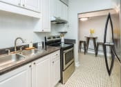 Thumbnail 9 of 21 - Hayes House stainless steel appliances