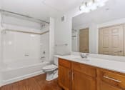 Thumbnail 30 of 30 - a bathroom with a sink toilet and a bath tub