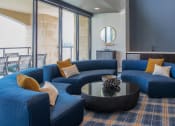 Thumbnail 18 of 75 - semi-circular couches around a circular coffee table indoors at The Apex at CityPlace, Overland Park, KS