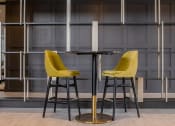 Thumbnail 11 of 75 - two barstools around a high top table at The Apex at CityPlace, Kansas