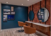 Thumbnail 28 of 75 - two chairs at desks and two circular mirrors on the wall at The Apex at CityPlace, Overland Park