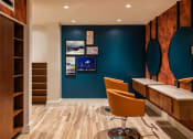 Thumbnail 26 of 75 - office with two chairs at desks, shelving, and circular mirrors on the wall at The Apex at CityPlace, Overland Park, 66210
