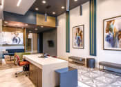 Thumbnail 49 of 75 - modern office waiting area with a desk and benches at The Apex at CityPlace, Overland Park, KS, 66210