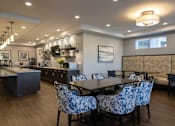 Thumbnail 27 of 34 - Community kitchen seating at Aspen Ridge 55+ Active Adult Community