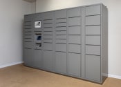 Thumbnail 8 of 37 - a large set of gray lockers in the corner of a room