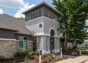 Thumbnail 1 of 37 - the front of a house with a walkway and landscaping