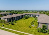 Thumbnail 40 of 42 - A Building With Spacious Lawn at Capitol Grove Apartments, Des Moines, Iowa