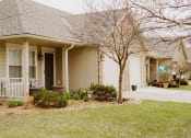 Thumbnail 1 of 23 - a house with a tree in the front yard