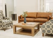 Thumbnail 4 of 23 - a living room filled with furniture and a large window