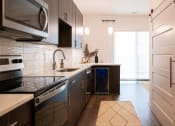 Thumbnail 16 of 50 - Kitchen with ample storage at The Residences at Galleria, Overland Park, KS, 66211
