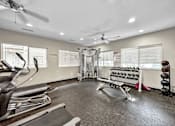 Thumbnail 4 of 42 - A Gym With Celling Fan at Capitol Grove Apartments, Des Moines, 50317