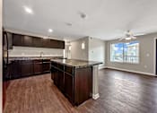 Thumbnail 30 of 42 - A Kitchen With a Marble Countertop at Capitol Grove Apartments, Iowa