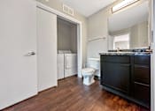Thumbnail 34 of 42 - A Bathroom With a Cabinet at Capitol Grove Apartments, Iowa