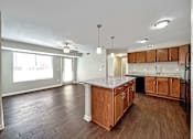 Thumbnail 10 of 42 - A Kitchen With Marble Countertop at Capitol Grove Apartments, Iowa, 50317