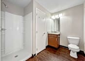 Thumbnail 16 of 42 - A Bathroom With a Toilet at Capitol Grove Apartments, Des Moines, IA