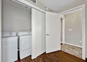 Thumbnail 35 of 42 - A Laundry Room at Capitol Grove Apartments, Des Moines