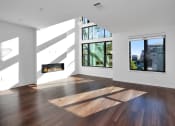 Thumbnail 15 of 86 - A living room with a fireplace at 44 Washington, Kansas City, MO 64111