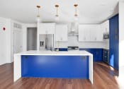 Thumbnail 14 of 86 - Kitchen with blue cabinets at 44 Washington, Kansas City