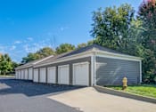 Thumbnail 18 of 18 - A long garage with a fire hydrant in front of it.
