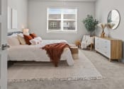 Thumbnail 23 of 36 - a bedroom with a bed and a ceiling fan at Hillcrest Village, Springdale, AR