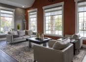 Thumbnail 6 of 50 - a living room with brown walls and white windows
