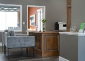 Thumbnail 11 of 50 - a home office with a desk and chairs