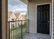 Thumbnail 47 of 50 - the view from the balcony with a black door