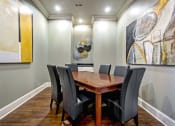 Thumbnail 6 of 37 - meeting room with table and chairs and co-working space