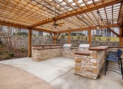 Thumbnail 17 of 37 - pergola with two outdoor grills and seating