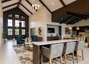 Thumbnail 4 of 44 - a large lobby with a bar and a living room  at The Clearing at ONE28, Kansas
