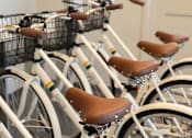 Thumbnail 40 of 44 - a row of bikes parked next to each other at The Clearing at ONE28, Olathe, KS, 66062