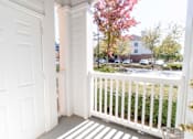 Thumbnail 41 of 44 - A white door is open to a balcony with a white railing. at The Crest at Sugarloaf, Lawrenceville, 30044