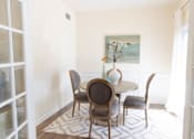 Thumbnail 40 of 44 - A dining room with a table and chairs. at The Crest at Sugarloaf, Lawrenceville, 30044