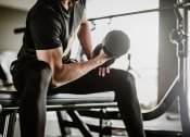 Thumbnail 60 of 60 - young man at the gym lifting a dumbbell free photo at The Crest at South Point, McDonough, 30253