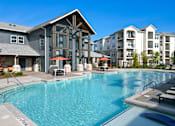 Thumbnail 11 of 30 - Resort style swimming pool with covered pavilion at The Crest at Acworth Apartments, Acworth, GA 30102