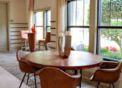 Thumbnail 18 of 27 - a dining room with a table and chairs at The Crest at Laurel Canyon Apartments, Canton, GA, 30114