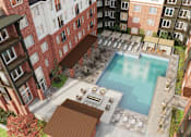 Thumbnail 44 of 53 - pool surrounded by buildings at District on the Etowah Apartments, Canton