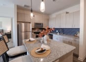 Thumbnail 1 of 54 - a kitchen with granite counter tops and stainless steel appliances at The Crest at Acworth, Acworth, Georgia
